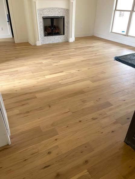 Large room flooring installation by AVS Flooring