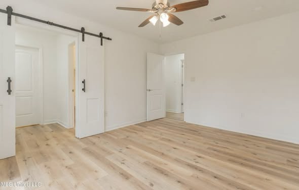 Light flooring installation in bedroom by AVS Flooring